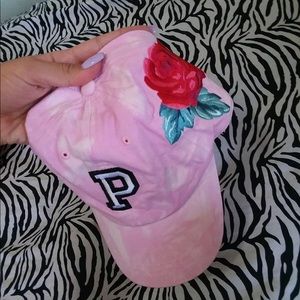 PINK baseball cap.
